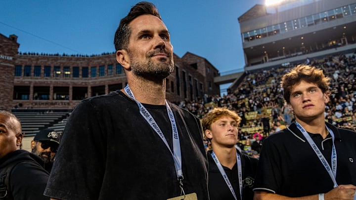 Heisman-winning quarterback Matt Leinart, a member of the Fox Big Noon Kickoff crew, walks the CU sideline before the Rocky Mountain Showdown on Sept. 16, 2023 at Folsom Field in Boulder, Colo.