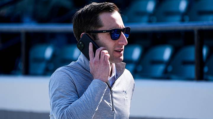 Detroit Tigers general manager Jeff Greenberg on the phone at practice during spring training at TigerTown in Lakeland, Fla. on Friday, Feb. 20, 2026. Detroit Tigers general manager Jeff Greenberg on the phone at practice during spring training at TigerTown in Lakeland, Fla. on Friday, Feb. 20, 2026.