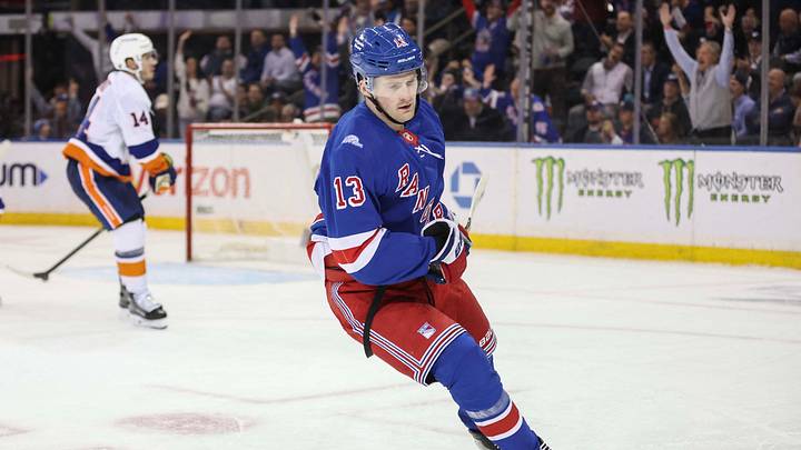 Oct 6, 2026; New York, New York, USA;  New York Rangers left wing Alexis Lafreniere (13) circles back to the bench after scoring a goal in the third period against the New York Islanders at Madison Square Garden.  Mandatory Credit: Wendell Cruz-Imagn Images
