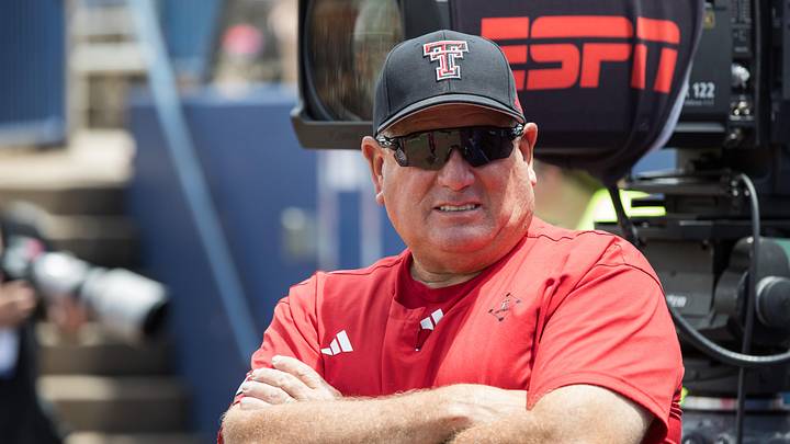 May 30, 2026; Oklahoma City, OK, USA; Texas Tech Red Raiders head coach Gerry Glasco watches warmups before the game against the Tennessee Lady Volunteers during the NCAA Women’s College World Series at Devon Park. Mandatory Credit: Brett Rojo-Imagn Images May 30, 2026; Oklahoma City, OK, USA; Texas Tech Red Raiders head coach Gerry Glasco watches warmups before the game against the Tennessee Lady Volunteers during the NCAA Women’s College World Series at Devon Park. Mandatory Credit: Brett Rojo-Imagn Images