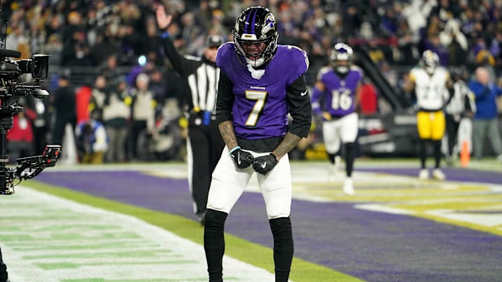 Jan 11, 2025; Baltimore, Maryland, USA; Baltimore Ravens wide receiver Rashod Bateman (7) celebrates after scoring a touchdown against the Pittsburgh Steelers in the first quarter in an AFC wild card game at M&T Bank Stadium. Mandatory Credit: Mitch Stringer-Imagn Images