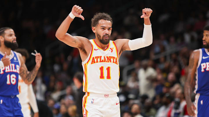 Oct 14, 2024; Atlanta, Georgia, USA; Atlanta Hawks guard Trae Young (11) reacts after an offensive foul against the Philadelphia 76ers in the second quarter at State Farm Arena. Mandatory Credit: Brett Davis-Imagn Images
