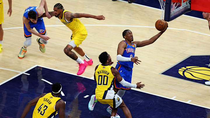 Jun 11, 2025; Indianapolis, Indiana, USA; Oklahoma City Thunder forward Jalen Williams (8) shoots the ball against Indiana Pacers guard Bennedict Mathurin (00) during the fourth quarter in game three of the 2025 NBA Finals at Gainbridge Fieldhouse. Mandatory Credit: Trevor Ruszkowski-Imagn Images