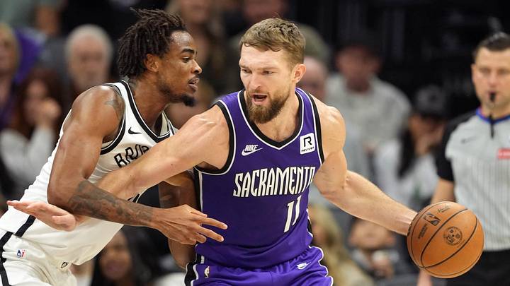 Nov 24, 2024; Sacramento, California, USA; Sacramento Kings forward Domantas Sabonis (11) dribbles against Brooklyn Nets center Nic Claxton (left) during the second quarter at Golden 1 Center. Nov 24, 2024; Sacramento, California, USA; Sacramento Kings forward Domantas Sabonis (11) dribbles against Brooklyn Nets center Nic Claxton (left) during the second quarter at Golden 1 Center.