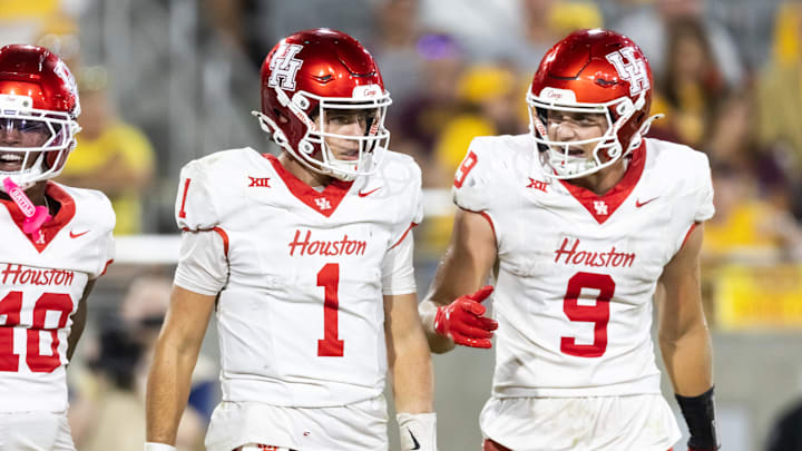 Oct 25, 2025; Tempe, Arizona, USA; Houston Cougars quarterback Conner Weigman (1) and tight end Tanner Koziol (9) against the Arizona State Sun Devils at Mountain America Stadium. Mandatory Credit: Mark J. Rebilas-Imagn Images
