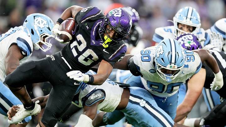 Aug 29, 2026; Dublin, Co. Dublin, IRL;  TCU Horned Frogs running back Jeremy Payne (26) breaks the tackle of North Carolina Tar Heels defensive back Kaleb Cost (2) in the second half at Aviva Stadium.  Mandatory Credit: Laszlo Geczo-Imagn Images