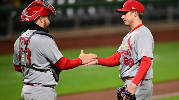 Apr 8, 2025; Pittsburgh, Pennsylvania, USA; St. Louis Cardinals relief pitcher Phil Maton (88) congratulates catcher Pedro Pages (43) after defeating the Pittsburgh Pirates at PNC Park. Mandatory Credit: David Dermer-Imagn Images