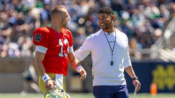 Apr 25, 2026; Notre Dame, IN, USA; Notre Dame Fighting Irish head coach Marcus Freeman talks with quarterback CJ Carr (13) during the Blue-Gold game at Notre Dame Stadium. Mandatory Credit: Michael Caterina-Imagn Images