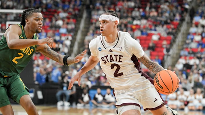 Mar 21, 2025; Raleigh, NC, USA; Baylor Bears guard Jayden Nunn (2) defends against Mississippi State Bulldogs guard Riley Kugel (2) during the first half in the first round of the NCAA Tournament at Lenovo Center. Mandatory Credit: Zachary Taft-Imagn Images