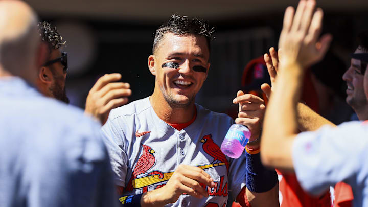 Aug 31, 2025; Cincinnati, Ohio, USA; St. Louis Cardinals outfielder Lars Nootbaar (21) high fives teammates after scoring on a sacrifice fly out hit by designated hitter Ivan Herrera (not pictured) in the third inning against the Cincinnati Reds at Great American Ball Park. Mandatory Credit: Katie Stratman-Imagn Images Aug 31, 2025; Cincinnati, Ohio, USA; St. Louis Cardinals outfielder Lars Nootbaar (21) high fives teammates after scoring on a sacrifice fly out hit by designated hitter Ivan Herrera (not pictured) in the third inning against the Cincinnati Reds at Great American Ball Park. Mandatory Credit: Katie Stratman-Imagn Images