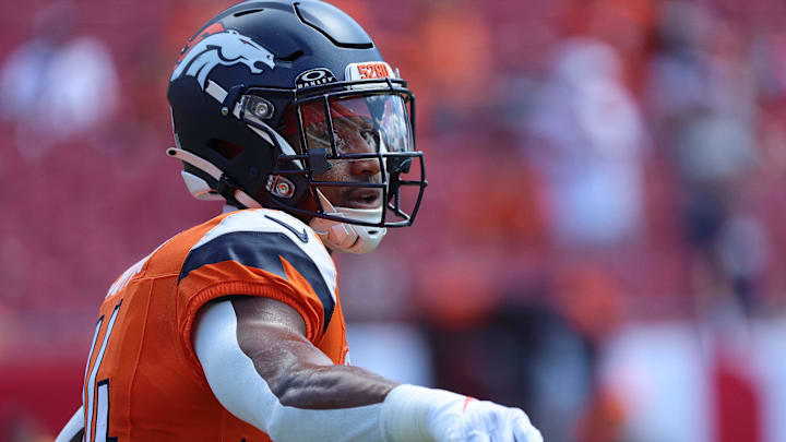 Sep 22, 2024; Tampa, Florida, USA;  Denver Broncos wide receiver Courtland Sutton (14) works out prior to the game against the Tampa Bay Buccaneers at Raymond James Stadium. Mandatory Credit: Kim Klement Neitzel-Imagn Images