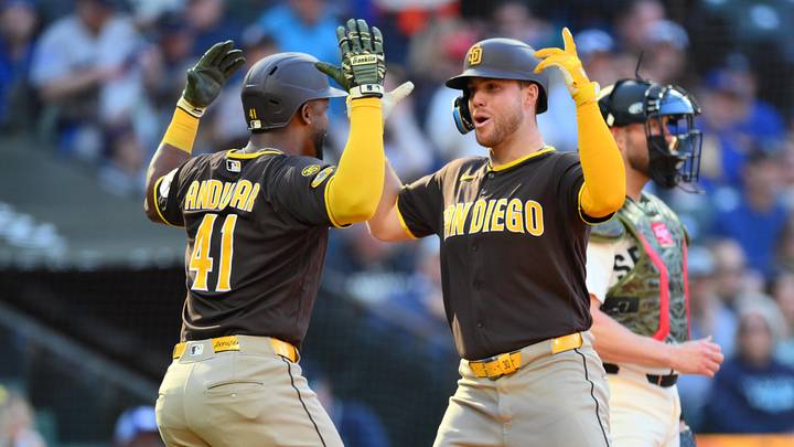 May 17, 2026; Seattle, Washington, USA; San Diego Padres third baseman Miguel Andujar (41) and left fielder Gavin Sheets (30) celebrate after Sheets hit a 2-run home run against the Seattle Mariners during the sixth inning at T-Mobile Park. Mandatory Credit: Steven Bisig-Imagn Images