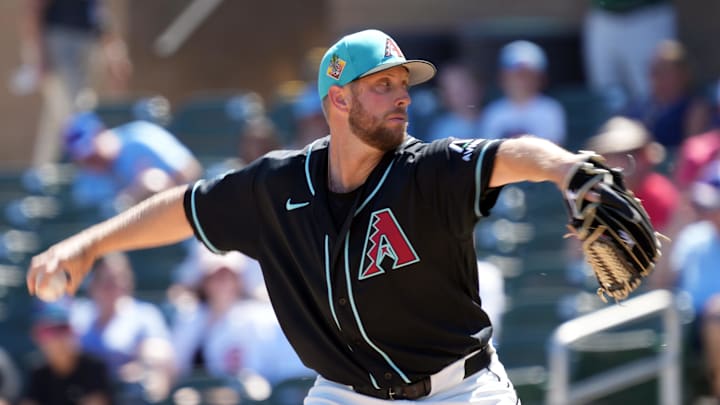 Mar 18, 2026; Salt River Pima-Maricopa, Arizona, USA; Arizona Diamondbacks pitcher Merrill Kelly (29) throws against the Chicago Cubs in the first inning at Salt River Fields at Talking Stick. Mandatory Credit: Rick Scuteri-Imagn Images