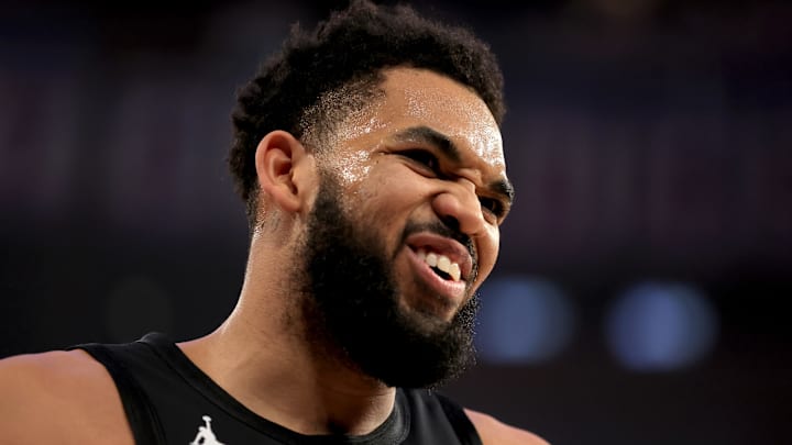 Jan 27, 2026; New York, New York, USA; New York Knicks center Karl-Anthony Towns (32) reacts during the first quarter against the Sacramento Kings at Madison Square Garden.