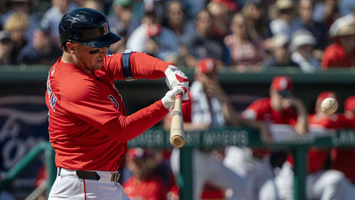 Feb 23, 2025; Fort Myers, Florida, USA; Boston Red Sox infielder Alex Bregman (2) connects with the ball for a double in the fourth inning of their game against the Toronto Blue Jays at JetBlue Park at Fenway South. Mandatory Credit: Chris Tilley-Imagn Images