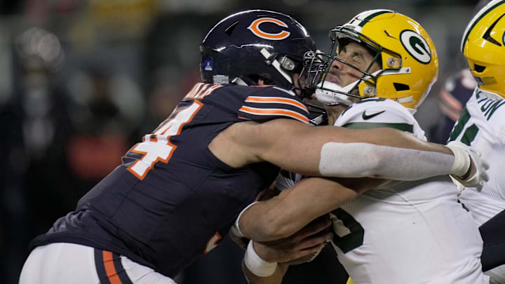 Jordan Love is sacked by Bears defensive end Austin Booker and suffers a concussion. Booker has been fined for the hit.