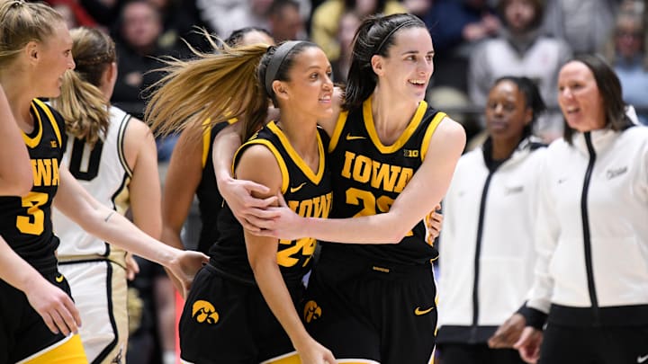 Iowa women's basketball stars Caitlin Clark and Gabbie Marshall celebrate a win over Purdue. Iowa women's basketball stars Caitlin Clark and Gabbie Marshall celebrate a win over Purdue.