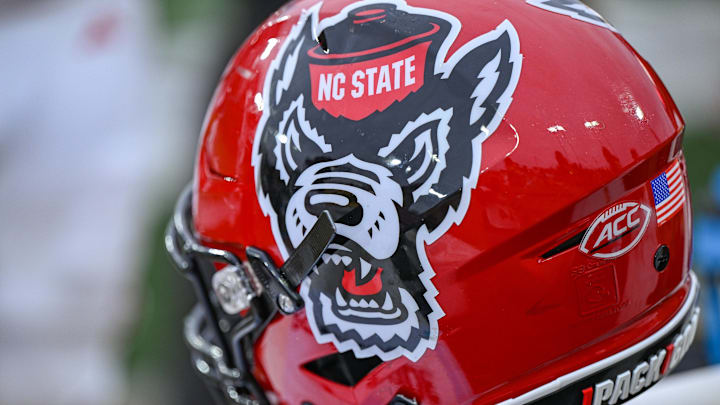 Nov 11, 2023; Winston-Salem, North Carolina, USA; The North Carolina State Wolfpack helmet rests on the bench during the second half against the Wake Forest Demon Deacons at Allegacy Federal Credit Union Stadium. Mandatory Credit: William Howard-Imagn Images Nov 11, 2023; Winston-Salem, North Carolina, USA; The North Carolina State Wolfpack helmet rests on the bench during the second half against the Wake Forest Demon Deacons at Allegacy Federal Credit Union Stadium. Mandatory Credit: William Howard-Imagn Images