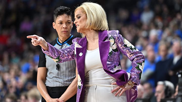 Mar 30, 2025; Spokane, WA, USA; LSU Lady Tigers head coach Kim Mulkey talks with an official against the UCLA Bruins during the first half of a Elite 8 NCAA Tournament basketball game at Spokane Arena. Mandatory Credit: James Snook-Imagn Images Mar 30, 2025; Spokane, WA, USA; LSU Lady Tigers head coach Kim Mulkey talks with an official against the UCLA Bruins during the first half of a Elite 8 NCAA Tournament basketball game at Spokane Arena. Mandatory Credit: James Snook-Imagn Images