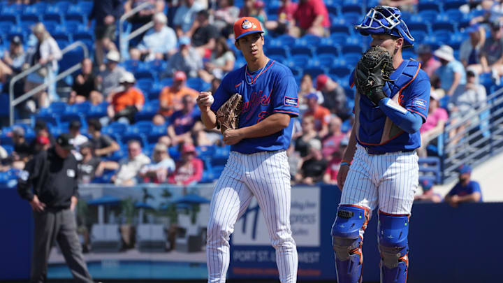 Feb 25, 2026; Port St. Lucie, Florida, USA;  New York Mets pitcher Jonah Tong (21) talks with catcher Hayden Senger (6) after giving up a three-run home run in the third inning to the St. Louis Cardinals at Clover Park. Mandatory Credit: Jim Rassol-Imagn Images