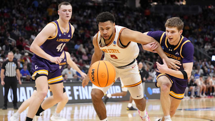 Jacob Ognacevic (41) watches Iowa State's Joshua Jefferson and teammate Joe Anderson chase a loose ball. Jacob Ognacevic (41) watches Iowa State's Joshua Jefferson and teammate Joe Anderson chase a loose ball.