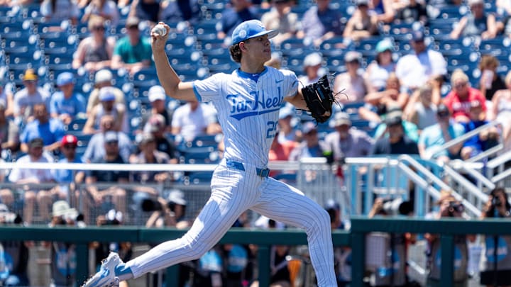 Jun 14, 2024; Omaha, NE, USA; North Carolina Tar Heels starting pitcher Jason DeCaro (29) throws the opening pitch against the Virginia Cavaliers at Charles Schwab Filed Omaha. Mandatory Credit: Dylan Widger-Imagn Images