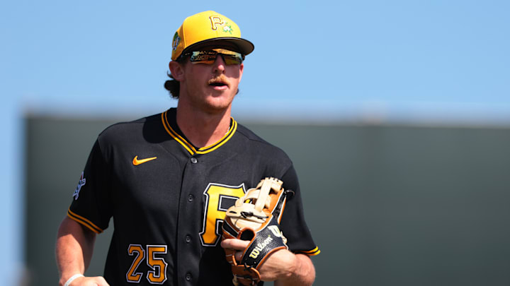Mar 1, 2026; Jupiter, Florida, USA; Pittsburgh Pirates center fielder Billy Cook (25) returns to the dugout against the St. Louis Cardinals during the second inning at Roger Dean Chevrolet Stadium. Mandatory Credit: Sam Navarro-Imagn Images