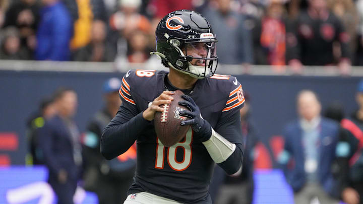 Oct 13, 2024; London, United Kingdom; Chicago Bears quarterback Caleb Williams (18) throws the ball against the Jacksonville Jaguars in the first half during an NFL International Series game at Tottenham Hotspur Stadium. Mandatory Credit: Kirby Lee-Imagn Images