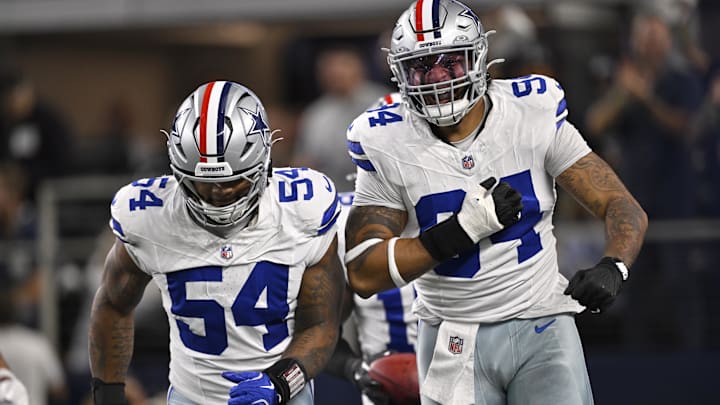 Dallas Cowboys defensive end Marshawn Kneeland celebrates with defensive end Sam Williams after recovering a blocked punt for a touchdown against the Arizona Cardinals in the first half at AT&T Stadium. Dallas Cowboys defensive end Marshawn Kneeland celebrates with defensive end Sam Williams after recovering a blocked punt for a touchdown against the Arizona Cardinals in the first half at AT&T Stadium.
