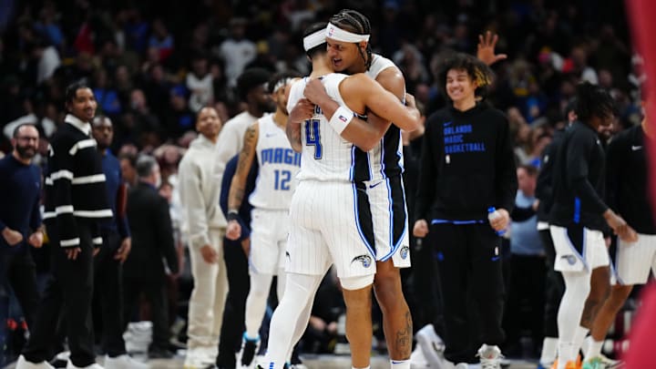 Jan 5, 2024; Denver, Colorado, USA; Orlando Magic guard Jalen Suggs (4) and forward Paolo Banchero (5) celebrate defeating the Denver Nuggets at Ball Arena. Mandatory Credit: Ron Chenoy-Imagn Images Jan 5, 2024; Denver, Colorado, USA; Orlando Magic guard Jalen Suggs (4) and forward Paolo Banchero (5) celebrate defeating the Denver Nuggets at Ball Arena. Mandatory Credit: Ron Chenoy-Imagn Images