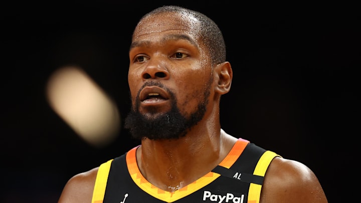 Nov 26, 2024; Phoenix, Arizona, USA; Phoenix Suns forward Kevin Durant (35) against the Los Angeles Lakers during an NBA Cup game at Footprint Center.