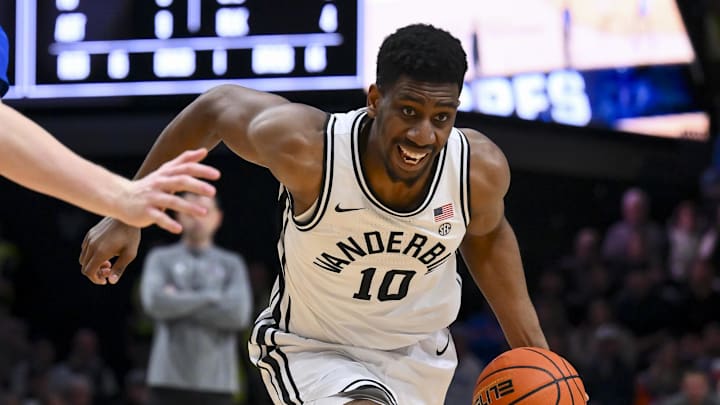Jan 17, 2026; Nashville, Tennessee, USA;  Vanderbilt Commodores forward Ak Okereke (10) drives to the basket against the Florida Gators during the second half at Memorial Gymnasium. Mandatory Credit: Steve Roberts-Imagn Images