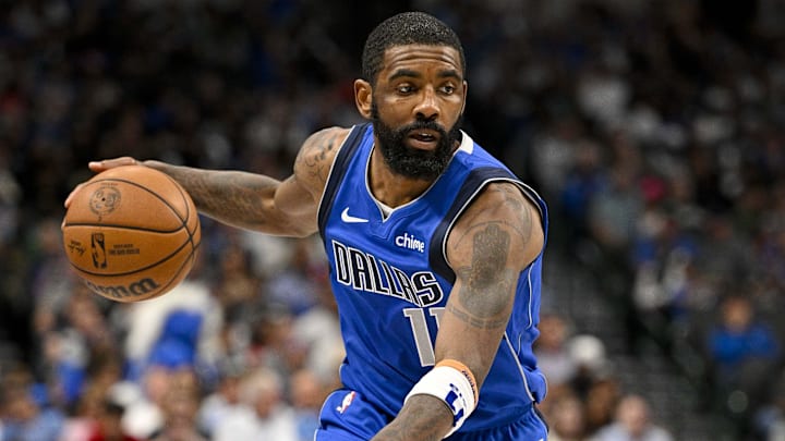 Apr 4, 2024; Dallas, Texas, USA; Dallas Mavericks guard Kyrie Irving (11) brings the ball up court against the Atlanta Hawks during the second half at the American Airlines Center. Mandatory Credit: Jerome Miron-Imagn Images Apr 4, 2024; Dallas, Texas, USA; Dallas Mavericks guard Kyrie Irving (11) brings the ball up court against the Atlanta Hawks during the second half at the American Airlines Center. Mandatory Credit: Jerome Miron-Imagn Images