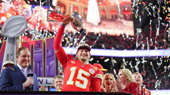 Feb 11, 2024; Paradise, Nevada, USA; Kansas City Chiefs quarterback Patrick Mahomes (15) holds the the Vince Lombardi Trophy after winning Super Bowl LVIII against the San Francisco 49ers at Allegiant Stadium. Mandatory Credit: Kirby Lee-Imagn Images