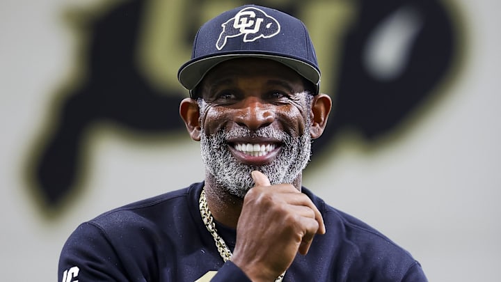 Apr 4, 2025; Boulder, CO, USA; Colorado Buffaloes head coach Deion Sanders watches as his players go through drills at the University of Colorado NFL Showcase at the CU Indoor Practice Facility. Mandatory Credit: Michael Ciaglo-Imagn Images