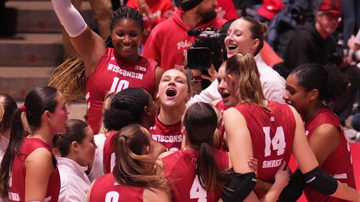 Wisconsin players celebrate a 3-1 victory over Michigan State on Saturday, November 30, 2024 at the UW Field House in Madison, Wisconsin.