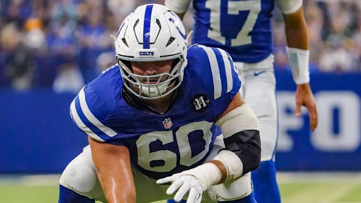 Indianapolis Colts guard Tanor Bortolini (60) hikes the ball to Indianapolis Colts quarterback Daniel Jones (17) on Saturday, Aug. 16, 2025, during a game against the Green Bay Packers at Lucas Oil Stadium in Indianapolis.