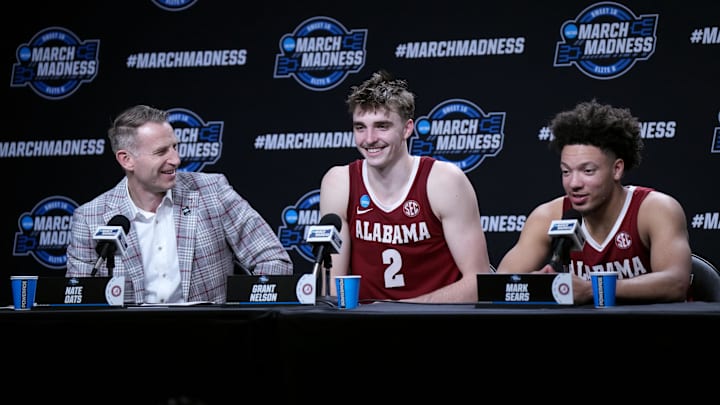 Mar 28, 2024; Los Angeles, CA, USA; Alabama Crimson Tide head coach Nate Oats talks with forward Grant Nelson (2) and guard Mark Sears (1) in a press conference after the game against the North Carolina Tar Heels. and in the semifinals of the West Regional of the 2024 NCAA Tournament at Crypto.com Arena. Mandatory Credit: Kirby Lee-Imagn Images Mar 28, 2024; Los Angeles, CA, USA; Alabama Crimson Tide head coach Nate Oats talks with forward Grant Nelson (2) and guard Mark Sears (1) in a press conference after the game against the North Carolina Tar Heels. and in the semifinals of the West Regional of the 2024 NCAA Tournament at Crypto.com Arena. Mandatory Credit: Kirby Lee-Imagn Images