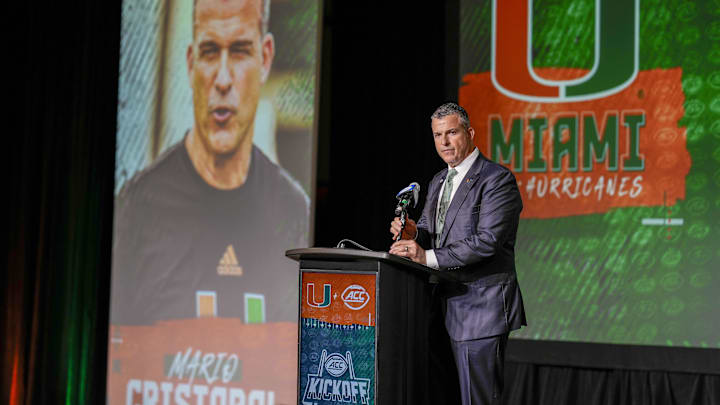 Jul 25, 2023; Charlotte, NC, USA;  Miami head coach Mario Cristobal answers questions during ACC Media Days at The Westin Charlotte. Mandatory Credit: Jim Dedmon-Imagn Images