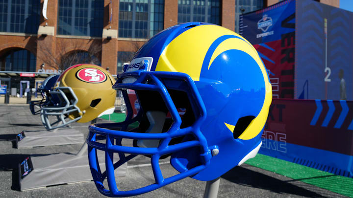 Feb 28, 2024; Indianapolis, IN, USA; Large Los Angeles Rams and San Francisco 49ers helmets at the NFL Scouting Combine Experience at Lucas Oil Stadium. Mandatory Credit: Kirby Lee-Imagn Images Feb 28, 2024; Indianapolis, IN, USA; Large Los Angeles Rams and San Francisco 49ers helmets at the NFL Scouting Combine Experience at Lucas Oil Stadium. Mandatory Credit: Kirby Lee-Imagn Images