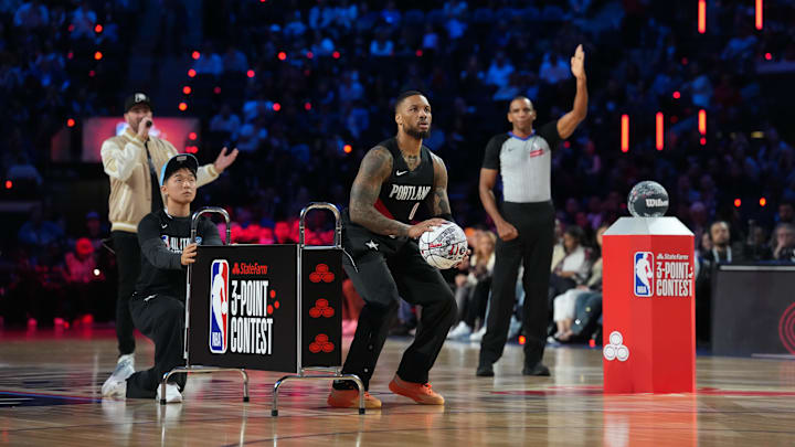 Portland Trail Blazers guard Damian Lillard won the NBA’s three-point contest for the third time.