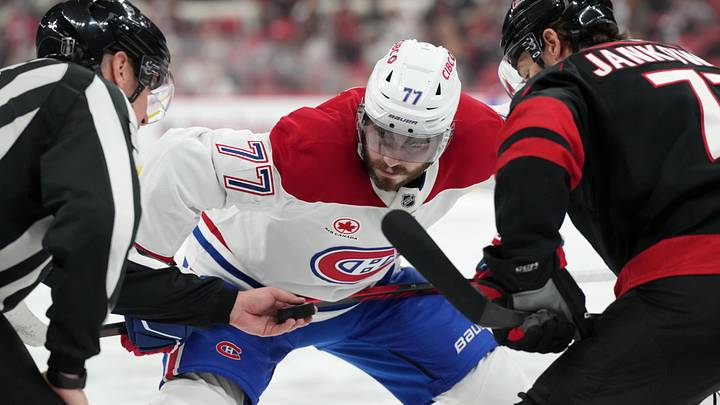 May 29, 2026; Raleigh, North Carolina, USA; Montreal Canadiens center Kirby Dach (77) prepares for a faceoff against Carolina Hurricanes left wing Mark Jankowski (77) in game five of the Eastern Conference Final of the 2026 Stanley Cup Playoffs during the second period at Lenovo Center. Mandatory Credit: James Guillory-Imagn Images