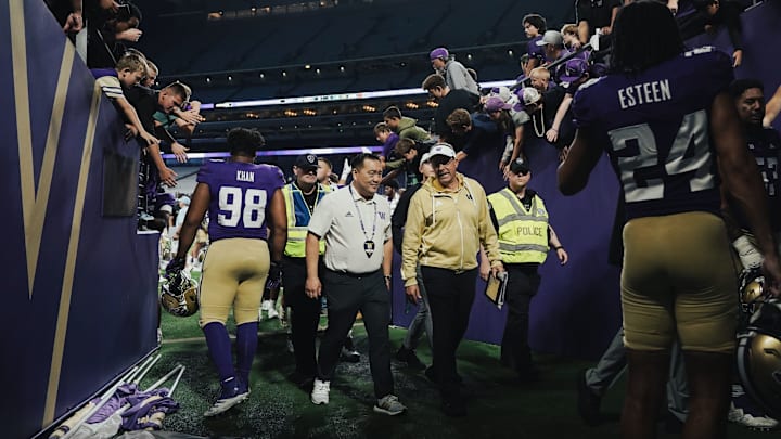 Omar Khan interacts with the Husky fans. 