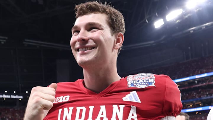 Jan 9, 2026; Atlanta, GA, USA; Indiana Hoosiers quarterback Fernando Mendoza (15) reacts after the 2025 Peach Bowl and semifinal game of the College Football Playoff at Mercedes-Benz Stadium. Jan 9, 2026; Atlanta, GA, USA; Indiana Hoosiers quarterback Fernando Mendoza (15) reacts after the 2025 Peach Bowl and semifinal game of the College Football Playoff at Mercedes-Benz Stadium.