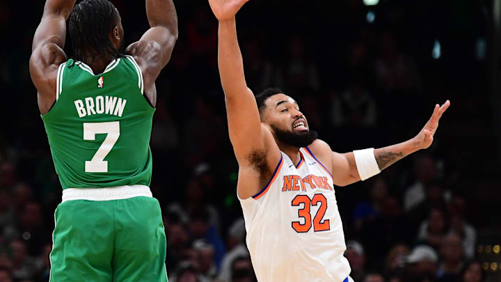 Feb 23, 2025; Boston, Massachusetts, USA; Boston Celtics guard Jaylen Brown (7) shoots the ball over New York Knicks center Karl-Anthony Towns (32) during the first half at TD Garden. Mandatory Credit: Bob DeChiara-Imagn Images Feb 23, 2025; Boston, Massachusetts, USA; Boston Celtics guard Jaylen Brown (7) shoots the ball over New York Knicks center Karl-Anthony Towns (32) during the first half at TD Garden. Mandatory Credit: Bob DeChiara-Imagn Images