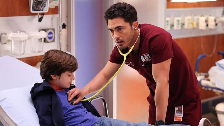 CHICAGO MED -- "Tomorrow, and Tomorrow, and Tomorrow" Episode 1204 -- Pictured: (l-r) Angus Caldwell as Caleb, Darren Barnett as Dr. John Frost
