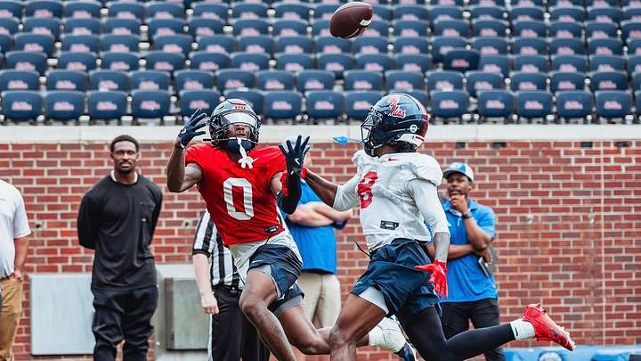 Ole Miss wide receiver Johntay Cook II goes up to make a contested catch against Ole Miss corner Antonio Kite during a spring practice inside Vaught-Hemingway Stadium (2026). Ole Miss wide receiver Johntay Cook II goes up to make a contested catch against Ole Miss corner Antonio Kite during a spring practice inside Vaught-Hemingway Stadium (2026).