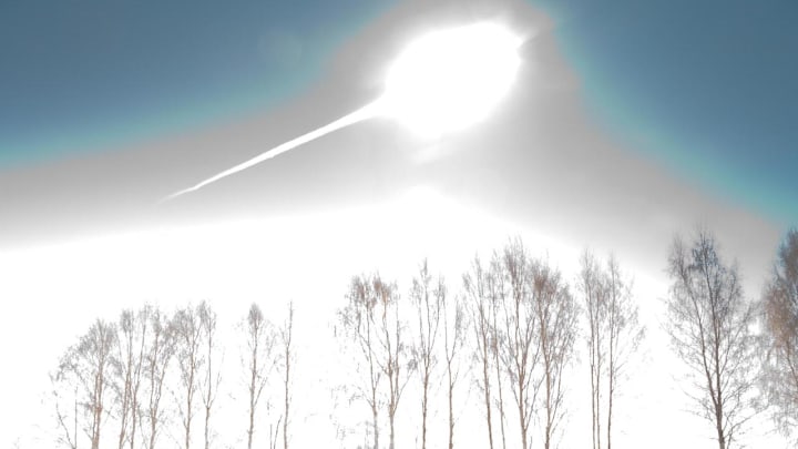 A fireball shoots across the skies over Chelyabinsk, Russia.