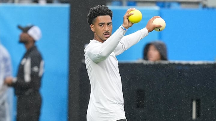 Aug 2, 2025; Charlottle, NC, USA; Carolina Panthers quarterback Bryce Young (9) warms up during Fanfest at Bank of America Stadium. Mandatory Credit: Jim Dedmon-Imagn Images