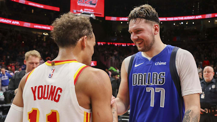 Jan 26, 2024; Atlanta, Georgia, USA; Atlanta Hawks guard Trae Young (11) talks to Dallas Mavericks guard Luka Doncic (77) after a game at State Farm Arena. Mandatory Credit: Brett Davis-Imagn Images Jan 26, 2024; Atlanta, Georgia, USA; Atlanta Hawks guard Trae Young (11) talks to Dallas Mavericks guard Luka Doncic (77) after a game at State Farm Arena. Mandatory Credit: Brett Davis-Imagn Images
